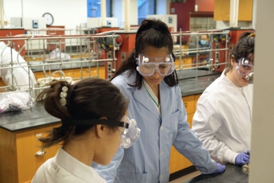 Teacher and her students working in the lab